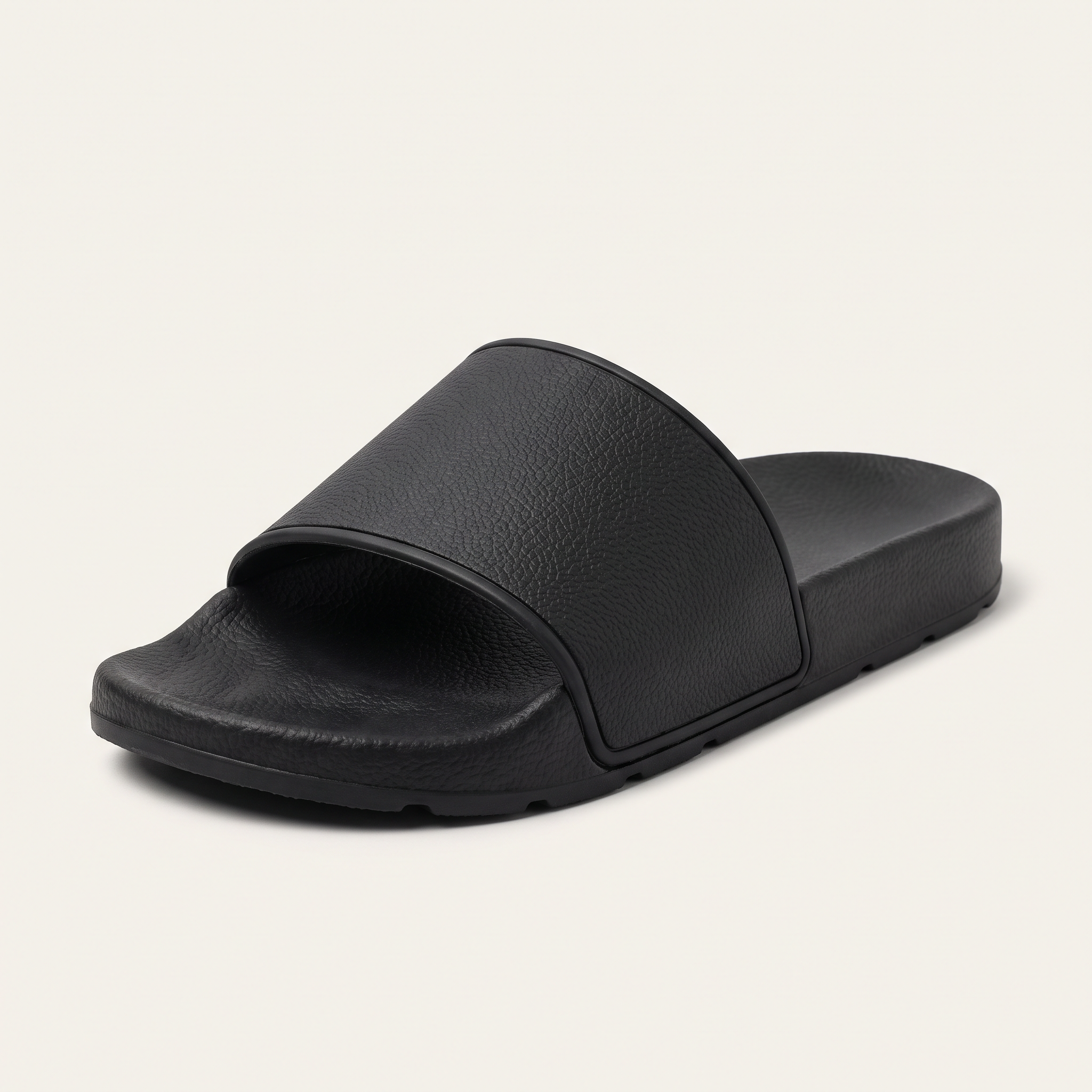 Black slide sandal, three quarter view